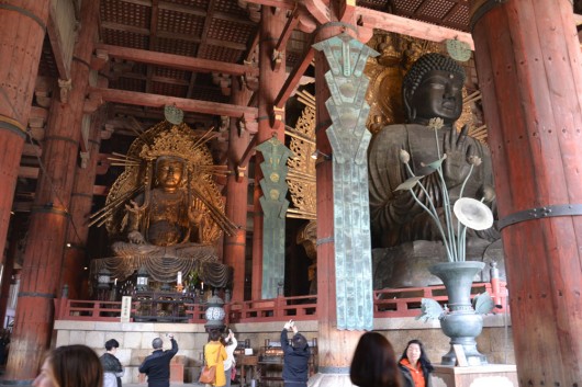 Giant buddha - small worshippers