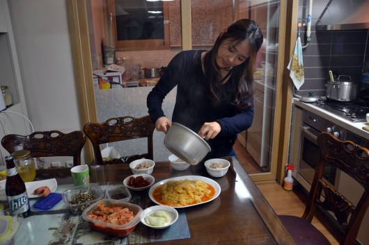 My host Yoon making us dinner with side dishes