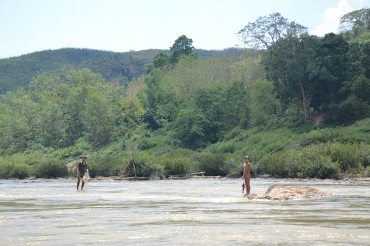 Local kids live and play around the river banks