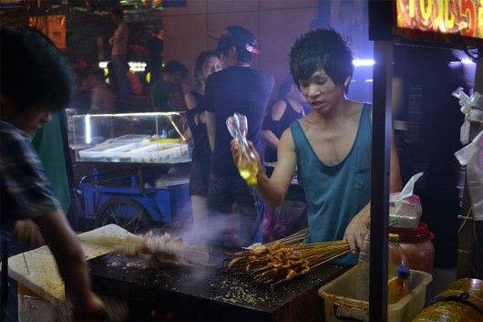 Streetfood vendors selling fried octopus!