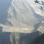 Some Inka platforms in the distance cut out in the rocks