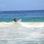 People surfing on the waves near Choroni