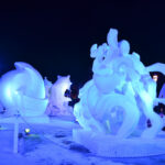 Snow sculptures festival at night